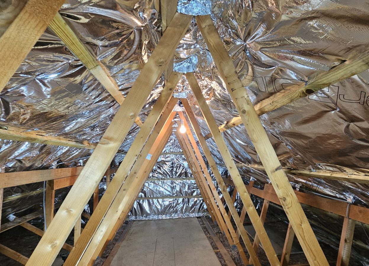 SuperFOIL reflective insulation fitted between loft rafters